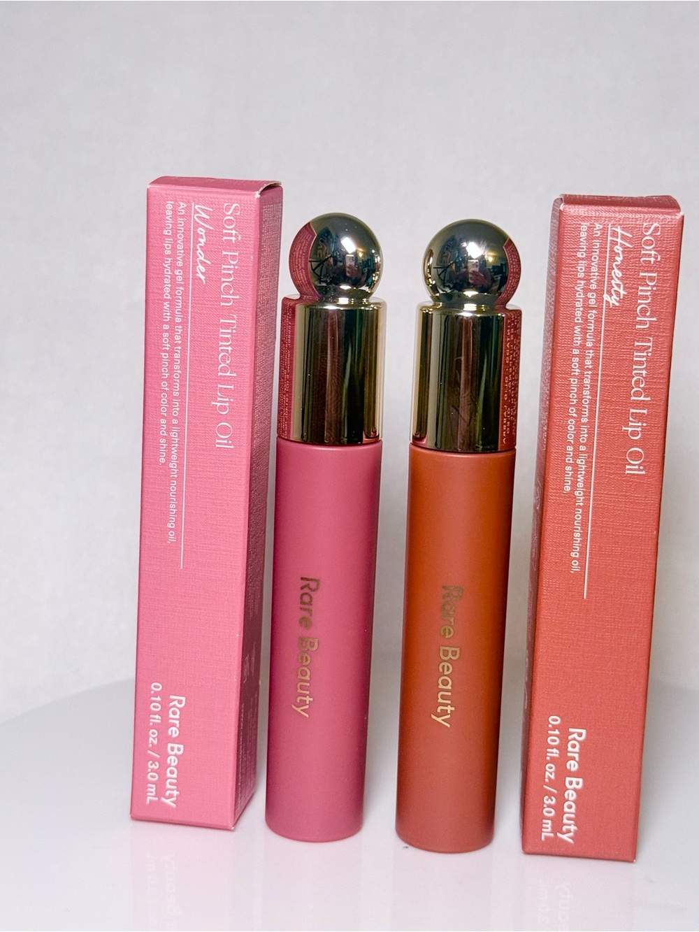 rare beauty glossy lip balm set of 2  honesty  and wander lip oil